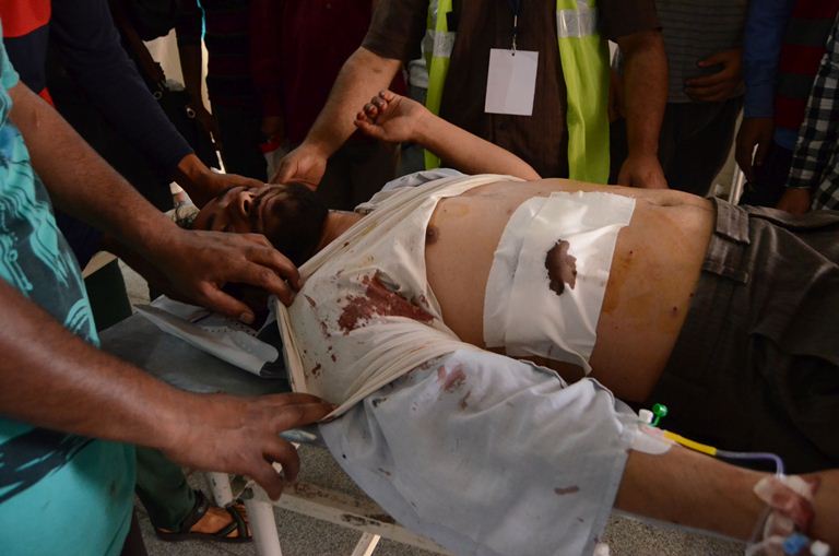 The bullet hit injured man from Kareemabad Pulwama being shifted to theatre in SMHS Hospital Srinagar. (KL Image: Bilal Bahadur)