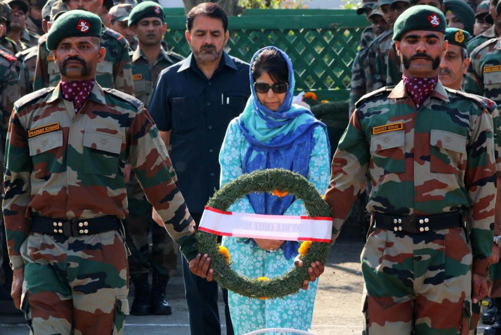 Chief Minister Ms Mehbooba Mufti laid floral wreath over the bodies of 17 slain army men killed in Uri attack on September 18, 2016. Bodies of the slain army troopers will be flown directly to their homes from Army's Badambagh Cantonment Srinagar. (KL Image: Bilal Bahadur)