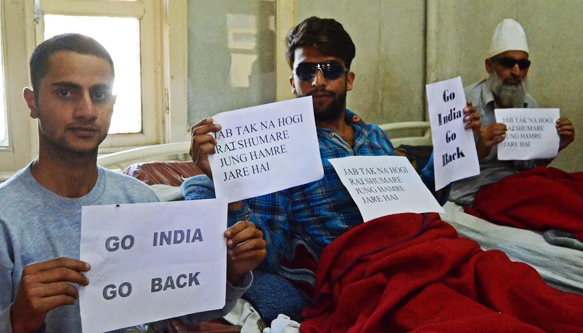 Pellet hit injured in SMHS Hospital Srinagar are on protest holding placards with demand fro RSD and plebiscite. KL photo chief Bilal Bahadur visited the hospital to find injured persons from Shopian being given treatment.