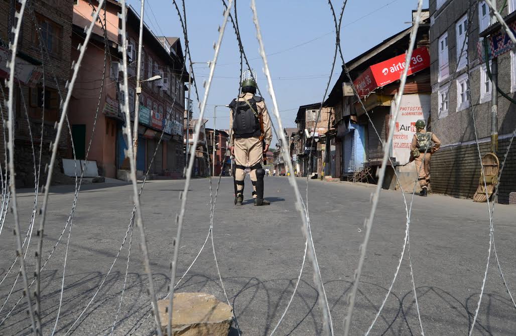 Kashmir is witnessing a mass uprising since July 09 2016. Curfew was imposed in several area of Srinagar on Sep 30, 2016. CRPF men stand alert in Downtown in view of Lal Chowk 'Chalo' call by pro-freedom leaders. (KL Image: Bilal Bahadur)