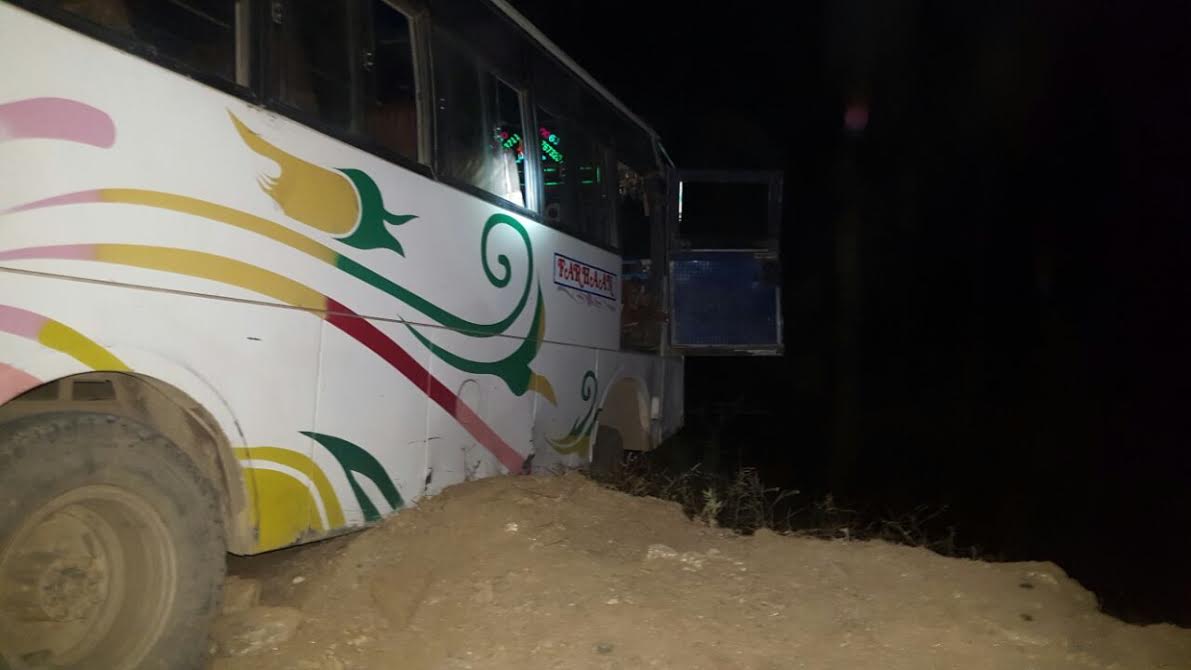 The ill fated bus at the accident spot at Bandarkot Kishtwar. (KL Image: Asif Iqbal Naik)