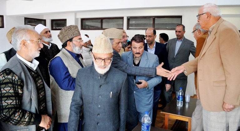 National Conference members greeting Dr Farooq Abdullah at Nawa-i-Subh party headquarters on Oct 26, 2016. (KL Image: Bilal Bhadaur)