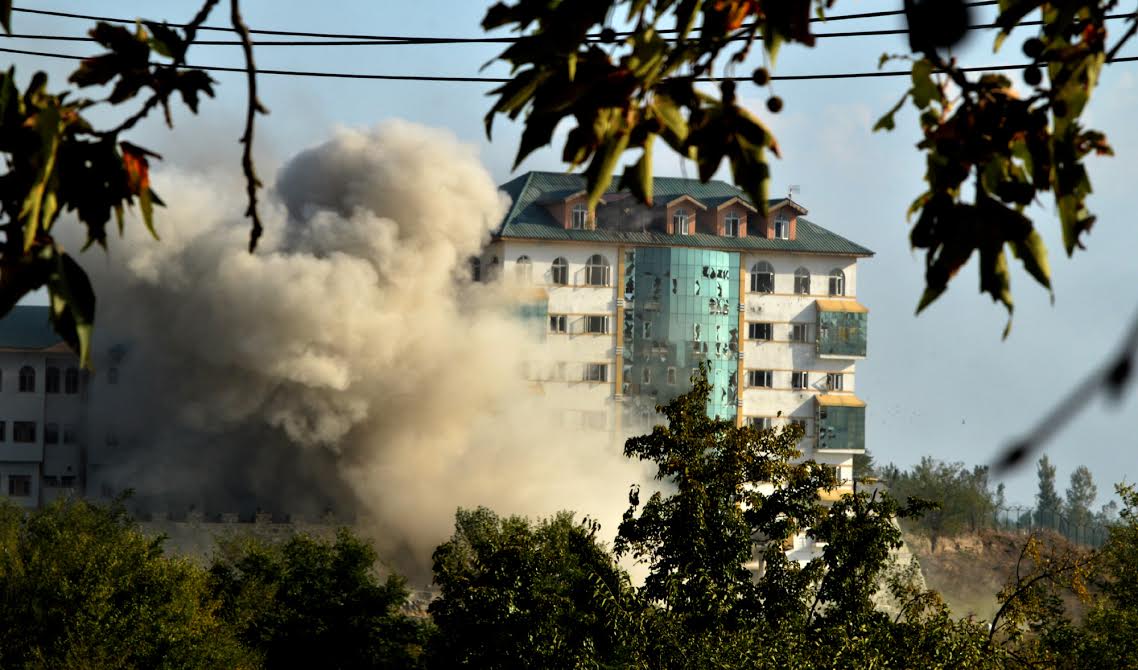 Army used IEDs to blast the EDI Hostel building in Sempora Pampore during an encounter on Oct 10, 2016. (KL Image courtesy: Mehraj Bhat)
