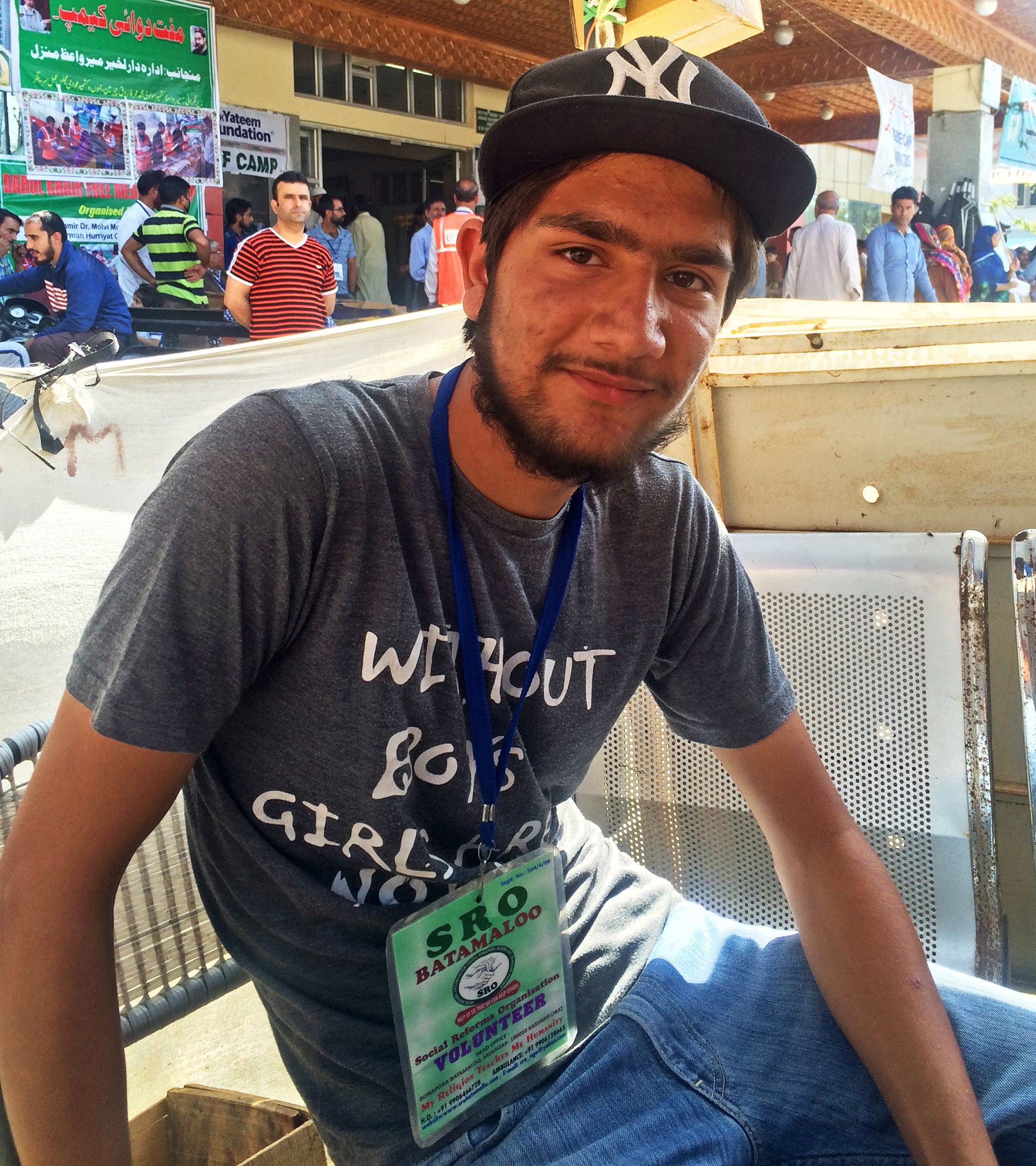 A volunteer Saqib Bashir, 17