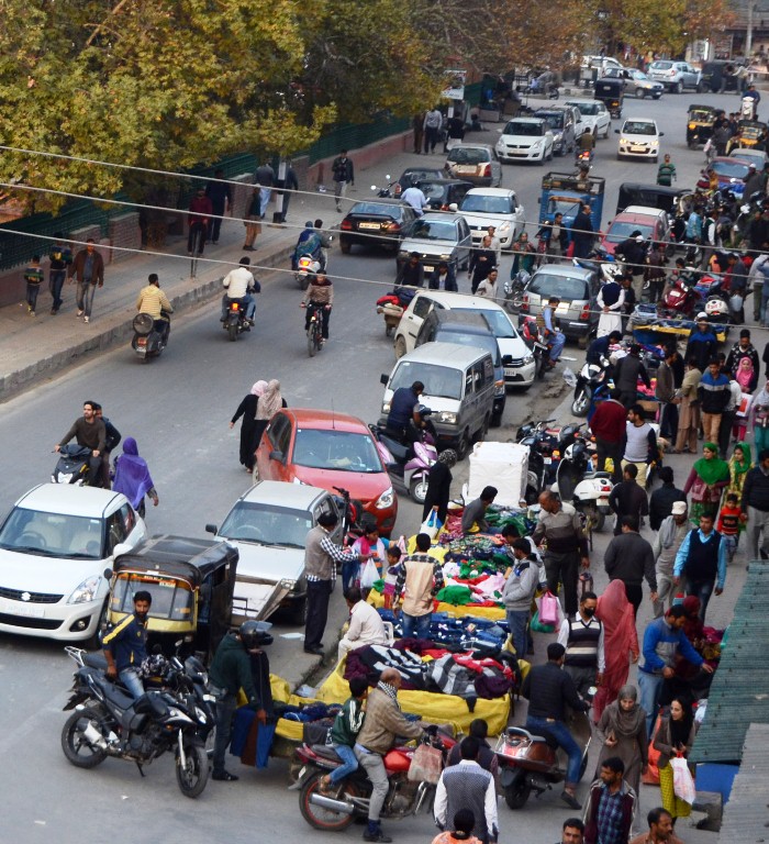 Shoppers throng Lal Chowk on Oct 23, 2016 during relaxation in shutdown to buy warm clothes as Kashmir is approaching winter. (KL Image: Bilal Bahadur)