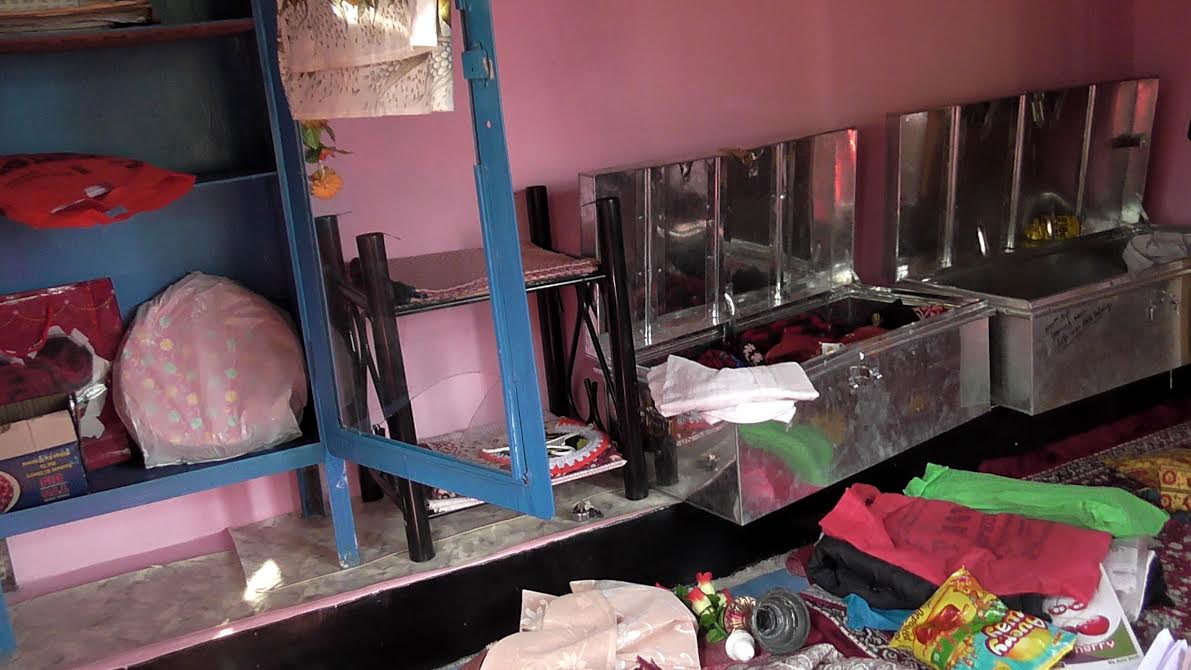 Forces arrested father of an active Hizbul Mujahideen militant, Omair Ahmad Ganie @Hanzulla, and allegedly ransacked their property, after raiding their house late night on Oct 25, 2016 in Souch village of South Kashmir’s Kulgam district. (KL Image: Shah Hilal)