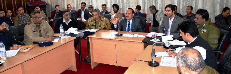 Law Minister presiding over a meeting