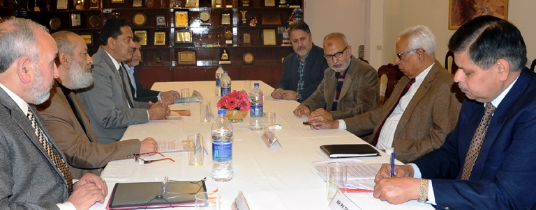 Governor N N Vohra presiding over a meeting of higher education