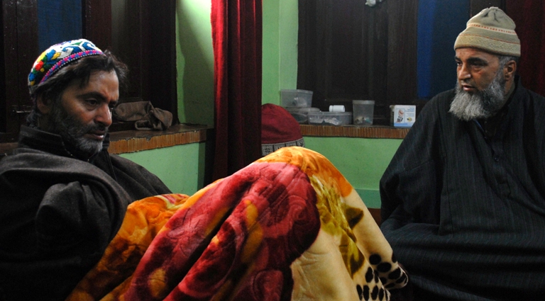 Yasin Malik with Burhan Wani's father Muzaffar Ahmad in Tral