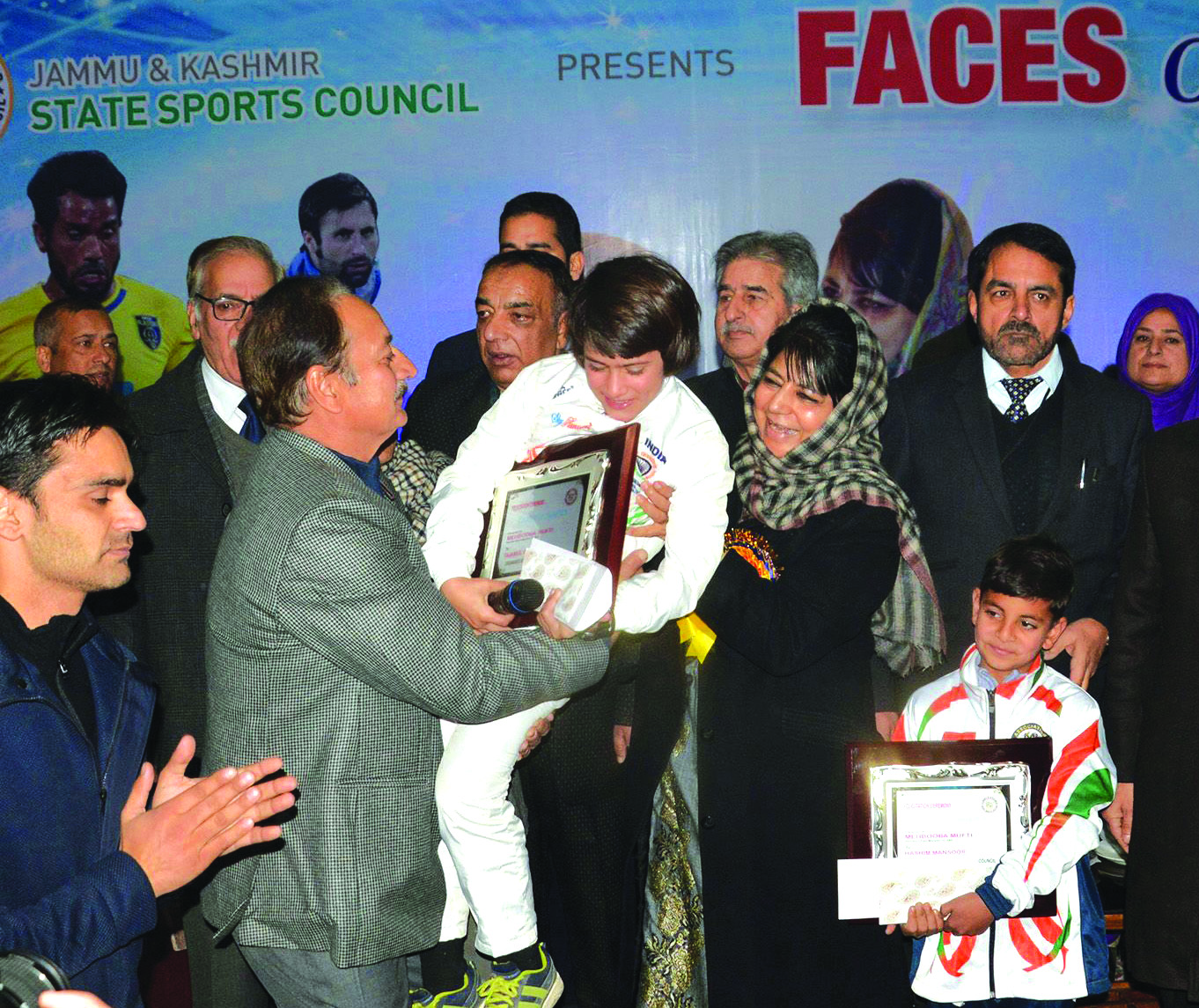 Jammu and Kashmir Chief Minister Mehbooba Mufti felicitates  two  Talent  of Kashmir  in sports  Tajamul Islam and Hashim Manzoor   give mementos during a function at Indoor Stadium in Srinagar   on Tuesday 06 December 2016 PHOTO BY BILAL BAHADUR