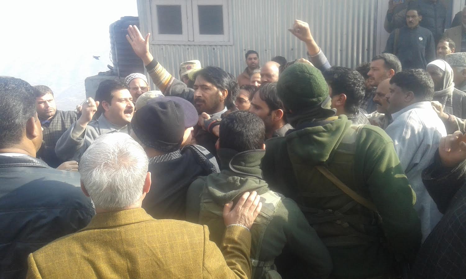 State congress chief GA Mir being detained ner Jawahar Tunnel in Qazigund. (KL Image by Shah Hilal)