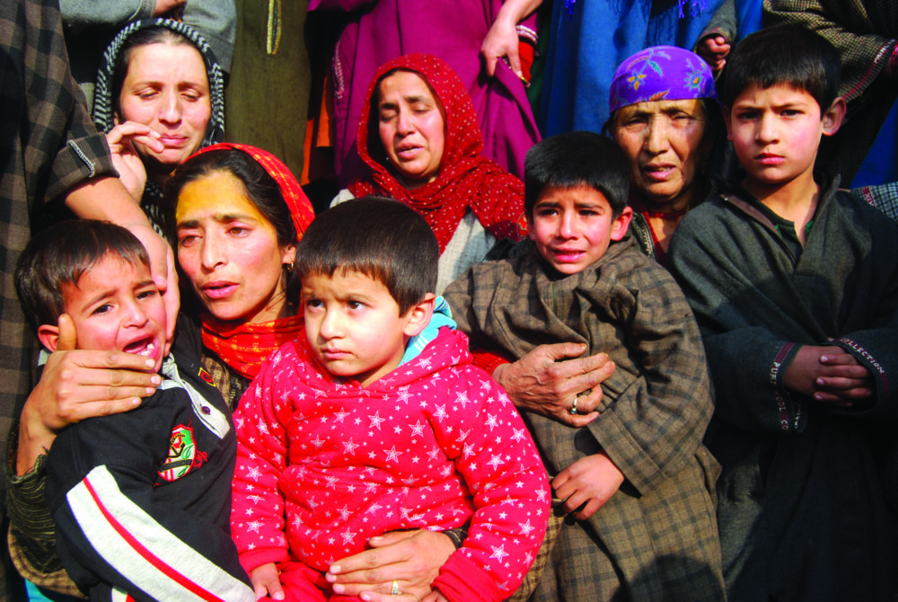 Wife of Sajad Malik along with children. (Photos: Shah Hilal/ KL)  