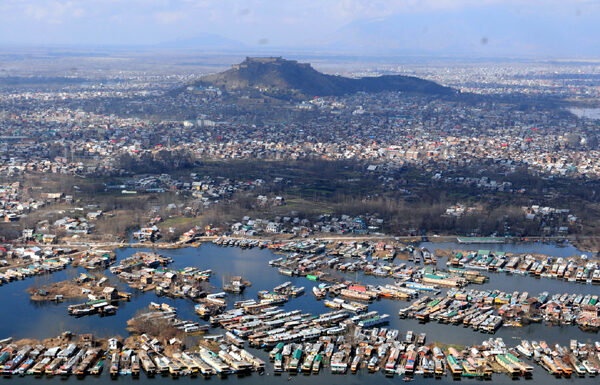 An aerial view of Srinagar city including parts of world famous Dal lake in Srinagar on Wednesday, as sun came out for the first time this week afrer rains lashed Kashmir valley and snow on the hills. The sun brought respite to the people from the cold wave.