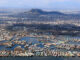 An aerial view of Srinagar city including parts of world famous Dal lake in Srinagar on Wednesday, as sun came out for the first time this week afrer rains lashed Kashmir valley and snow on the hills. The sun brought respite to the people from the cold wave.