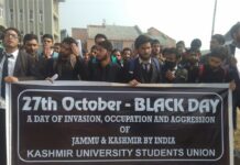 Kashmir University students march through varsity campus to observe ‘Oct 27 Black Day’