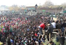 Scores participate in the funeral prayers of slain Waseem at Pulwama