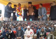 Amid rousing public meeting Dr Farooq welcomes Dr Sajad Uri into National Conference