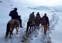 Kashmir has light snow in higher reaches, rains lash plains