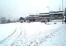 Rains lash valley, fresh snowfall in hills