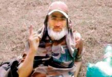 Pulwama village head in militant fatigues is hugely in debt, says police