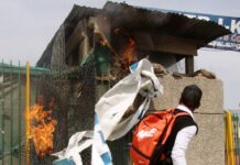 Amid protests students set force’s picket ablaze near Amar Singh College