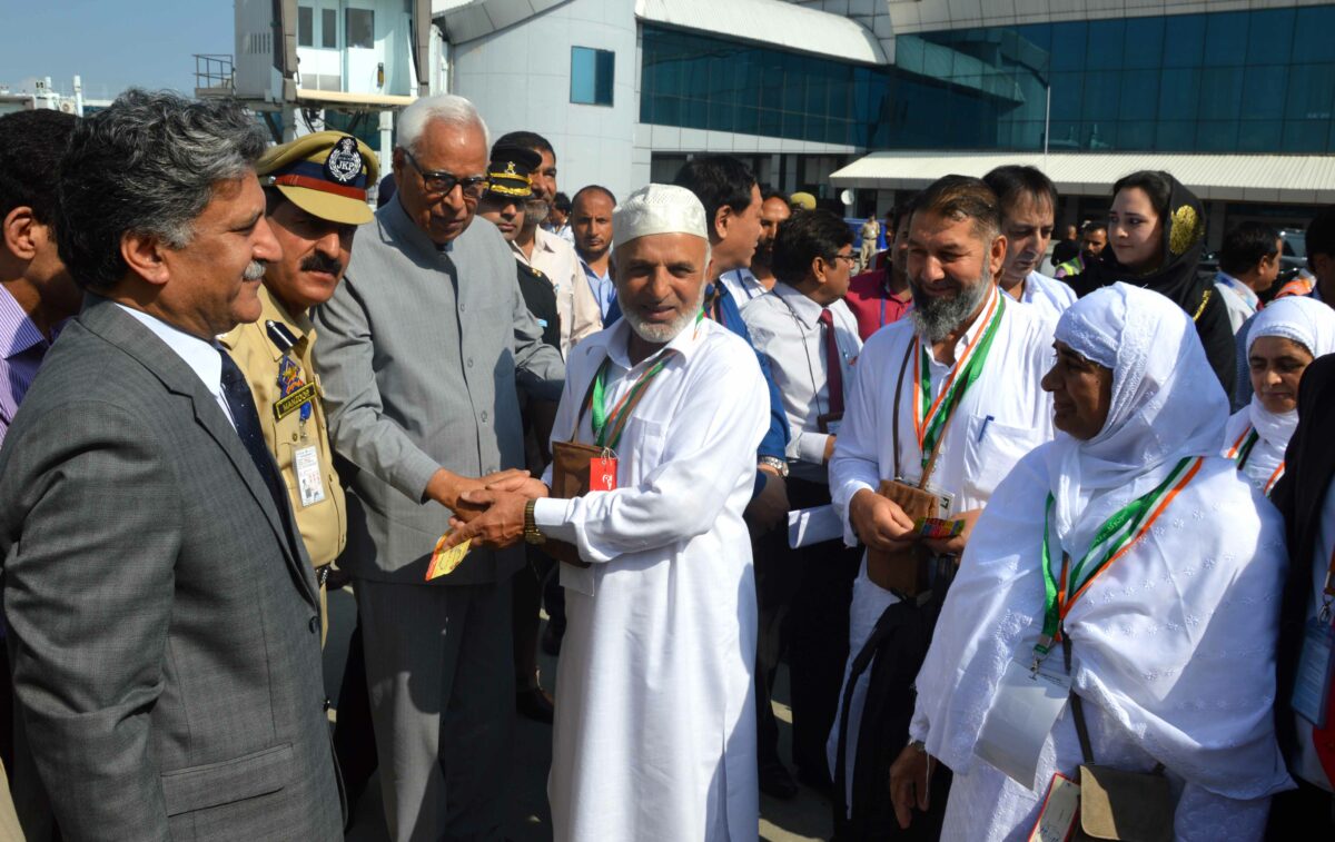 Haj 2018: Governor N N Vohra while interacting with Pilgrims at Srinagar airport.
