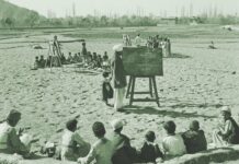 Schools On Distress Sale A 1955 photograph showing the students being taught in an open school.