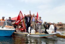 A Central Battle Dr Farooq Abdullah alongwith other party members during an election campaign in Dal Lake.