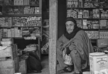 Ghulam Hassan Bangi at his shop. - Ruined Life - Kashmir Life - Story
