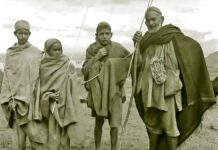 Traditional sheep-herders of Kashmir with their locally made grass slippers.