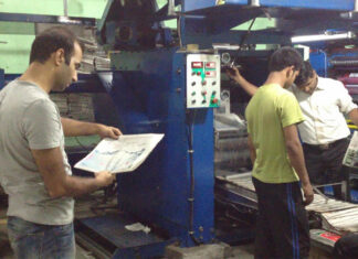 Kashmir Life team at printing press.
