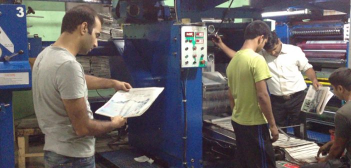 Kashmir Life team at printing press.