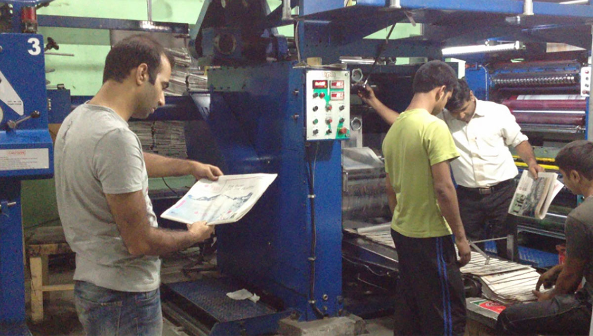Kashmir Life team at printing press.