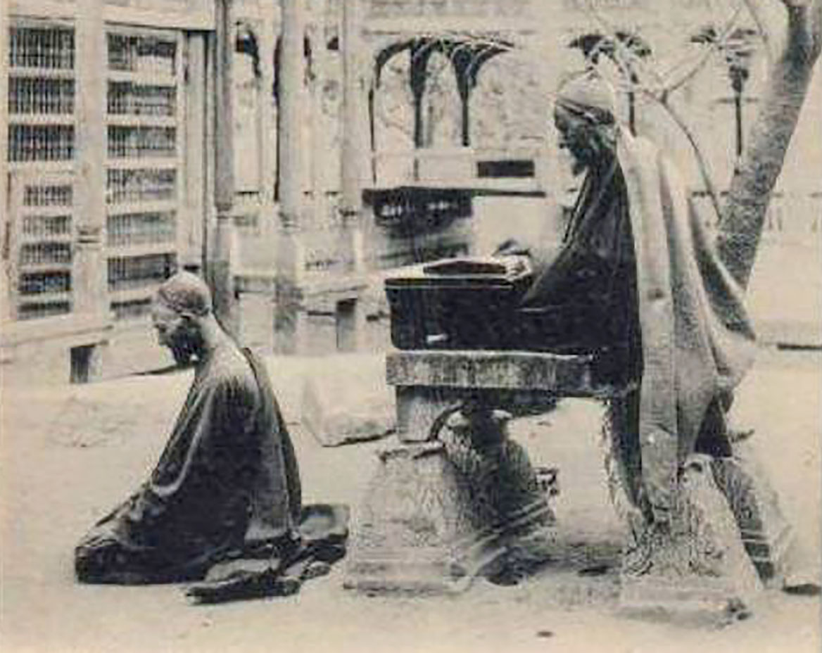 An undated photograph of early nineteenth century showing people praying in a Srinagar shrine.