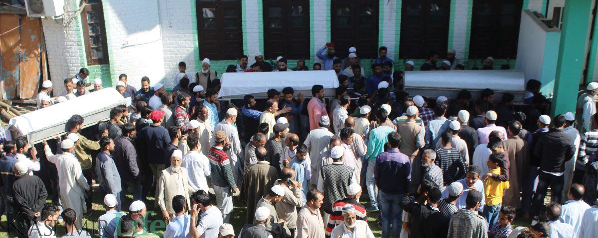 Three Friends, one Fate People carry bodies of three civilians during the funeral procession in Baramulla, on May 1, 2018. KL Image: Bilal Bahadur