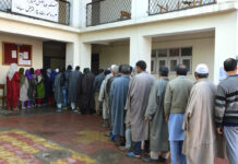 Voters in queue at a polling booth. Kashmir