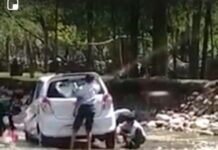 Govt teacher among two employees attached after video shows students washing their vehicles