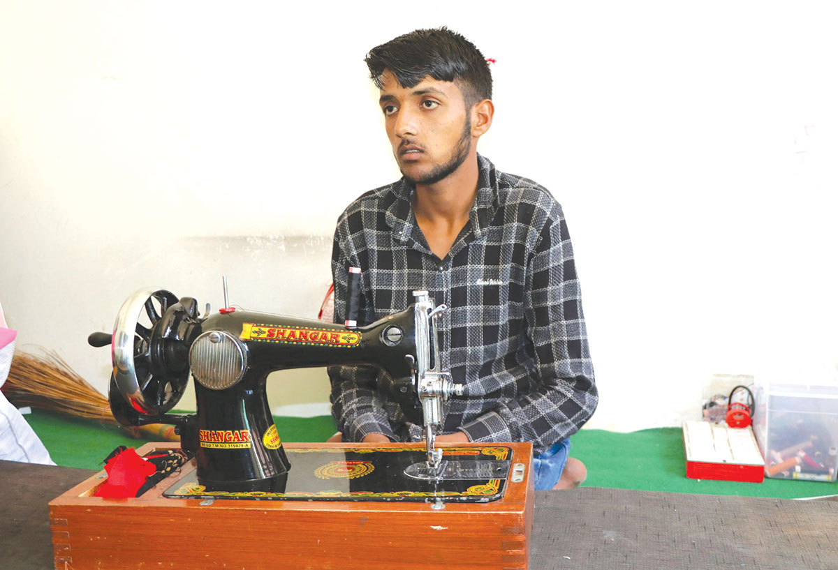 Nisar while learning the tailoring skill.