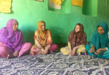 (L to R) Posha and Shaista Rashid with other members during thier self help group’s meeting in Shilwat village of Sumbal, Sonawari. KL Image by Shams Irfan