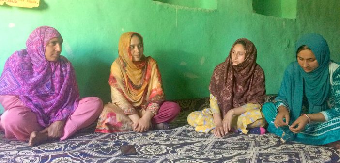 (L to R) Posha and Shaista Rashid with other members during thier self help group’s meeting in Shilwat village of Sumbal, Sonawari. KL Image by Shams Irfan