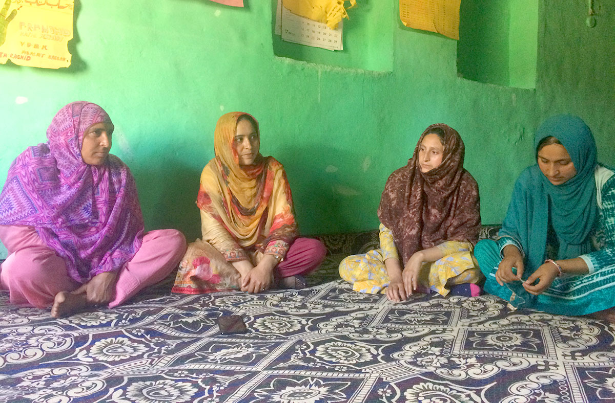 (L to R) Posha and Shaista Rashid with other members during thier self help group’s meeting in Shilwat village of Sumbal, Sonawari. KL Image by Shams Irfan