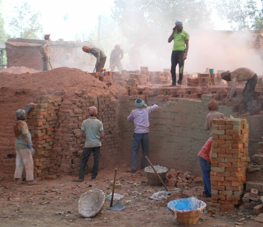 Workers on the job at a brick klin somewhere in district Budgam. KL Image: Bilal Bahadur