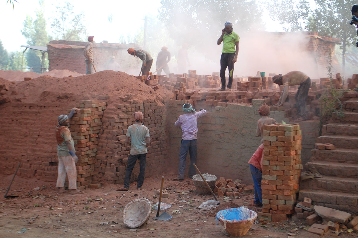 Workers on the job at a brick klin somewhere in district Budgam. KL Image: Bilal Bahadur