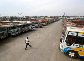 Public transport buses are parked inside Parimpora stand. KL Image: Bilal Bahadur