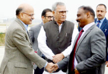 Chief Secretary BVR Subramanium greets Lt Governor GC Murmu.