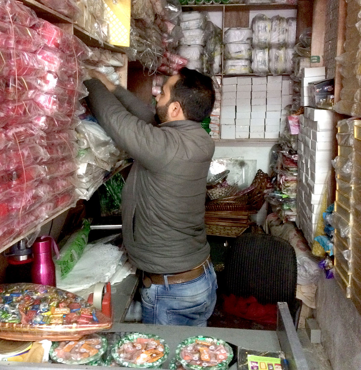 Mir Waseem working as helper at his uncle’s shop in main town Anantnag. KL Image by Umar Khurshid