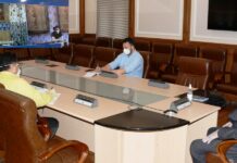 Advisor Baseer Khan reviews COVID-19 measures, stock position of essential commodities