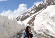 Female Photojournalist Booked For Social Media Posts