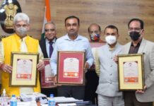 Lt Governor Releases Silver Souvenir Coin; Inaugurates E-Library
