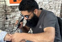A Kashmir Young Man Erases Tattoos Free of Cost